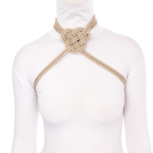 A photo graph of a rope collar made with a Trefoil Medallion, a type of knot with three interwoven nodes.
